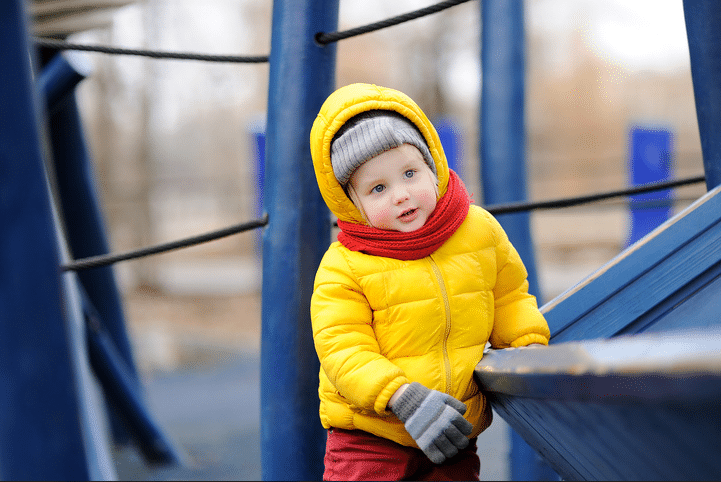 Little boy - benefits of outdoor play in winter